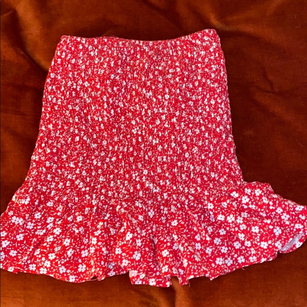 Strapless red smocked blouse